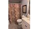 Cozy bathroom with a shower-tub combination and decorative shower curtain at 4425 Eastport Blvd. # I-1, Little River, SC 29566