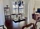 Dining room featuring wood table, stylish decor, and water view at 4425 Eastport Blvd. # I-1, Little River, SC 29566