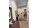 Inviting entryway with neutral paint and patterned chest at 4425 Eastport Blvd. # I-1, Little River, SC 29566