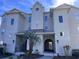Charming condo building featuring a well-manicured entrance, and crisp architectural details at 4425 Eastport Blvd. # I-1, Little River, SC 29566