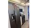 Modern kitchen with stainless steel appliances and white cabinets at 4425 Eastport Blvd. # I-1, Little River, SC 29566