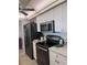 Bright kitchen featuring stainless steel appliances and white cabinets at 4425 Eastport Blvd. # I-1, Little River, SC 29566