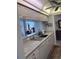 Bright kitchen featuring granite countertops and modern sink at 4425 Eastport Blvd. # I-1, Little River, SC 29566