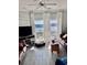 Inviting living room with water view, leather sofa, and stylish decor at 4425 Eastport Blvd. # I-1, Little River, SC 29566