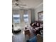 Comfortable living room with water view, leather sofa, and stylish decor at 4425 Eastport Blvd. # I-1, Little River, SC 29566