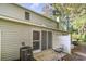 The home's backyard has a screened patio with outdoor grill and privacy fence at 4616 Lomax Ct. # 9-B, Murrells Inlet, SC 29576