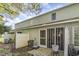 The backyard features a screened patio, fencing, and lush foliage, perfect for outdoor living at 4616 Lomax Ct. # 9-B, Murrells Inlet, SC 29576