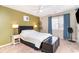 Comfortable bedroom with bright window, ceiling fan, and side tables with lamps at 4616 Lomax Ct. # 9-B, Murrells Inlet, SC 29576