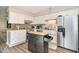 Kitchen with stainless steel appliances, a kitchen island, and white cabinets at 4616 Lomax Ct. # 9-B, Murrells Inlet, SC 29576