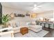 Open living space with a sectional sofa, bar seating, and stylish decor at 4616 Lomax Ct. # 9-B, Murrells Inlet, SC 29576