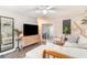 Bright living room featuring a TV, access to the patio, and contemporary decor at 4616 Lomax Ct. # 9-B, Murrells Inlet, SC 29576