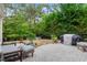 Outdoor patio with comfortable seating and a grill, perfect for relaxation and entertaining at 4697 Farm Lake Dr., Myrtle Beach, SC 29579