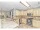 Well-equipped kitchen with granite countertops, stainless steel appliances, and ample cabinet space at 5 Old Barge Dr., Pawleys Island, SC 29585
