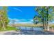 Picturesque marsh view with a dock, gazebo, and lush green vegetation under a bright blue sky at 5 Old Barge Dr., Pawleys Island, SC 29585