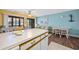 Bright living space showing an open floor plan with views to the kitchen, dining area, and outdoor views at 500 Fairway Village Dr. # 7-C, Myrtle Beach, SC 29588