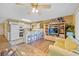 Living room featuring kitchen, entertainment center, comfortable seating, and stylish decor at 500 Fairway Village Dr. # 7-C, Myrtle Beach, SC 29588