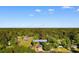 Aerial view of 509 S Rosemary Ave with a mix of mature trees and lawns at 509 S Rosemary Ave., Andrews, SC 29510