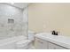 Modern bathroom with marble tile shower, new vanity, and updated fixtures at 509 S Rosemary Ave., Andrews, SC 29510