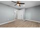 Bright bedroom featuring luxury vinyl plank flooring and a double door closet at 509 S Rosemary Ave., Andrews, SC 29510