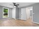 Bright bedroom featuring luxury vinyl plank flooring and a double door closet at 509 S Rosemary Ave., Andrews, SC 29510