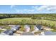 Aerial view of multiple homes in a neighborhood surrounded by trees at 534 War Eagle Ct., Conway, SC 29526