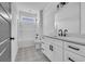 Modern bathroom with white vanity, patterned tile floors, and a shower-tub combination at 534 War Eagle Ct., Conway, SC 29526