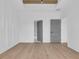 Bright bedroom with hardwood floors, gray doors and decorative wall trim at 534 War Eagle Ct., Conway, SC 29526