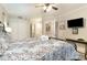 Bedroom features patterned bedspread, nautical decor, and access to ensuite bathroom at 5523 N Ocean Blvd. # 1201, Myrtle Beach, SC 29577