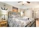 Comfortable bedroom with decorative wall art and a cozy bed with patterned bedspread at 5523 N Ocean Blvd. # 1201, Myrtle Beach, SC 29577