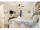 Cozy bedroom with decorative nautical elements and a comfortable bed with patterned bedding at 5523 N Ocean Blvd. # 1201, Myrtle Beach, SC 29577