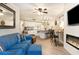Comfortable living room with a modern fireplace, and access to a fully equipped kitchen at 5523 N Ocean Blvd. # 1201, Myrtle Beach, SC 29577