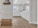 Spacious entryway featuring ceramic tile flooring, white walls and woodwork, and built-in shelving at 5801 Oyster Catcher Dr. # 1621, North Myrtle Beach, SC 29582