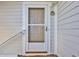 Front door with screen and visible street address at 5801 Oyster Catcher Dr. # 1621, North Myrtle Beach, SC 29582