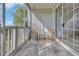 Relaxing screened patio with comfortable seating, perfect for enjoying the outdoors at 5801 Oyster Catcher Dr. # 1621, North Myrtle Beach, SC 29582