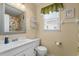 Bright bathroom with a white vanity, neutral walls, and decorative accents for a clean, fresh feel at 6001- 1776 S Kings Highway, Myrtle Beach, SC 29575