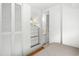 The bedroom features built-in storage, and a view into the bathroom at 6001- 1776 S Kings Highway, Myrtle Beach, SC 29575