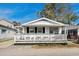Charming single-story home featuring a welcoming front porch at 6001- 1776 S Kings Highway, Myrtle Beach, SC 29575