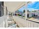 Relaxing porch with white rocking chairs offers a tranquil outdoor space at 6001- 1776 S Kings Highway, Myrtle Beach, SC 29575