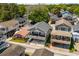 Charming elevated beach homes nestled in a lush, green neighborhood with tree coverage at 6001- 5432 S Kings Highway, Myrtle Beach, SC 29575