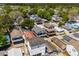 Charming elevated beach homes nestled in a lush, green neighborhood with tree coverage at 6001- 5432 S Kings Highway, Myrtle Beach, SC 29575