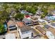 Charming elevated beach homes nestled in a lush, green neighborhood with tree coverage at 6001- 5432 S Kings Highway, Myrtle Beach, SC 29575
