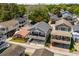 Charming elevated beach homes nestled in a lush, green neighborhood with tree coverage at 6001- 5432 S Kings Highway, Myrtle Beach, SC 29575