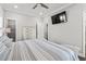 Well lit bedroom featuring a television and dresser for storage at 6001- 5432 S Kings Highway, Myrtle Beach, SC 29575