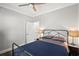 Bedroom featuring a metal bed frame, ceiling fan, and stylish lighting at 6001- 5432 S Kings Highway, Myrtle Beach, SC 29575