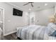 Bright bedroom with a television and a door leading to an outside balcony at 6001- 5432 S Kings Highway, Myrtle Beach, SC 29575