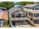 Stunning home with a large porch and views of the surrounding landscape at 6001- 5432 S Kings Highway, Myrtle Beach, SC 29575