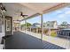Expansive outdoor porch featuring durable composite flooring, ceiling fans, and stunning neighborhood views at 6001- 5432 S Kings Highway, Myrtle Beach, SC 29575