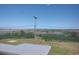 View of the backyard featuring grassy lawn and marshland in the distance, offering a scenic and natural setting at 640 Willowbank Rd., Georgetown, SC 29440