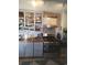 Updated kitchen featuring stainless steel appliances, butcher block countertops, and open shelving for storage at 640 Willowbank Rd., Georgetown, SC 29440