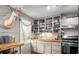 Well-lit kitchen featuring white cabinetry, stainless steel appliances, and butcher block countertops at 640 Willowbank Rd., Georgetown, SC 29440